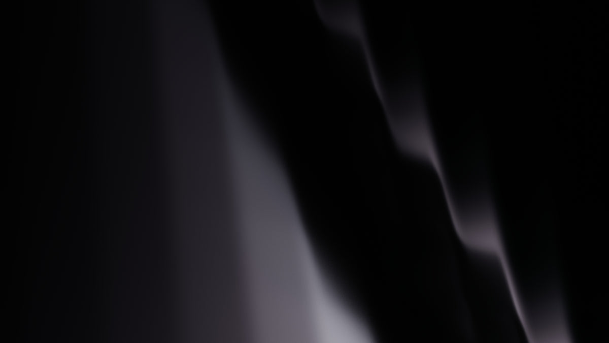 Abstract shades of dark gray.